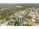Aerial view showcasing the home's location within the waterfront community at 130 Indian Creek Rd, Oak Hill, FL 32759