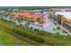 Aerial view of a commercial center with various businesses and ample parking at 1653 N Us Highway 1 # 201, Ormond Beach, FL 32174
