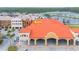 An aerial view of a commercial building with a large covered patio area at 1653 N Us Highway 1 # 201, Ormond Beach, FL 32174
