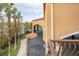 Balcony view of a lakeside pavilion and landscaping at 1653 N Us Highway 1 # 201, Ormond Beach, FL 32174