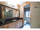 Elegant bathroom with granite vanity, large mirror, and separate shower at 1653 N Us Highway 1 # 201, Ormond Beach, FL 32174