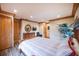 Bright bedroom with wood furniture and large bed at 1653 N Us Highway 1 # 201, Ormond Beach, FL 32174