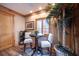 Small breakfast nook with table and chairs near window at 1653 N Us Highway 1 # 201, Ormond Beach, FL 32174