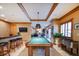 Game room with pool table, bar, and seating area at 1653 N Us Highway 1 # 201, Ormond Beach, FL 32174