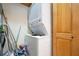 Stackable washer and dryer in a convenient laundry closet at 1653 N Us Highway 1 # 201, Ormond Beach, FL 32174