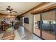 Living area with balcony access and hardwood floors at 1653 N Us Highway 1 # 201, Ormond Beach, FL 32174