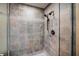 Large walk-in shower with neutral tile and double shower heads at 1653 N Us Highway 1 # 201, Ormond Beach, FL 32174