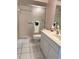 Clean bathroom with shower/tub combo and white vanity at 200 S Riverside Dr # 2010, New Smyrna Beach, FL 32168
