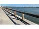 Wooden boardwalk along the waterfront with water views at 200 S Riverside Dr # 2010, New Smyrna Beach, FL 32168