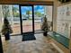 Building lobby with tiled floors, seating, and mailboxes at 200 S Riverside Dr # 2010, New Smyrna Beach, FL 32168