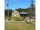 Stone memorial with a gazebo in a park-like setting at 200 S Riverside Dr # 2010, New Smyrna Beach, FL 32168