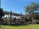 Wooden playground under a highway overpass at 200 S Riverside Dr # 2010, New Smyrna Beach, FL 32168