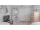 Bedroom with two twin beds, closet and ensuite bathroom at 2401 S Atlantic Ave # C206, New Smyrna Beach, FL 32169
