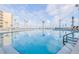 Inviting community pool with ample space for lounging and swimming at 2401 S Atlantic Ave # C206, New Smyrna Beach, FL 32169