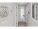 Hallway with beach-themed decor and access to other rooms at 2401 S Atlantic Ave # C206, New Smyrna Beach, FL 32169