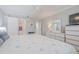 Spacious main bedroom with ensuite bathroom and coastal-themed bedding at 2401 S Atlantic Ave # C206, New Smyrna Beach, FL 32169