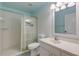 Clean bathroom with shower/tub combo, vanity, and updated fixtures at 2853 Turnbull Estates Dr, New Smyrna Beach, FL 32168