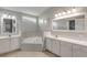 Spacious bathroom with double sinks, corner tub, and updated fixtures at 2853 Turnbull Estates Dr, New Smyrna Beach, FL 32168