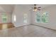 Bright dining area with wood and tile floors, and access to a patio at 2853 Turnbull Estates Dr, New Smyrna Beach, FL 32168