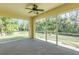 Spacious screened porch overlooking the backyard at 2853 Turnbull Estates Dr, New Smyrna Beach, FL 32168