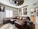 Rustic game room with leather sectional and western decor at 3145 S Atlantic Ave # 201, Daytona Beach Shores, FL 32118