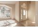 Bright and airy entryway with tile flooring and an arched window at 3198 Bower Ln, Deltona, FL 32725