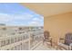 Relaxing balcony with pool and partial ocean view at 3501 S Atlantic Ave # 407, New Smyrna Beach, FL 32169
