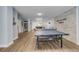 Bright game room with ping pong and seating at 3501 S Atlantic Ave # 407, New Smyrna Beach, FL 32169