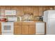 Updated kitchen, granite countertops, wood cabinets and appliances at 3501 S Atlantic Ave # 407, New Smyrna Beach, FL 32169