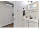 Small bathroom with sink, and closet at 3509 S Atlantic Ave # 108 & 109, New Smyrna Beach, FL 32169