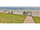 Oceanfront property with a brick pathway to the beach at 3509 S Atlantic Ave # 108 & 109, New Smyrna Beach, FL 32169