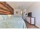 Bedroom with two beds, wood wall, and a dresser at 3509 S Atlantic Ave # 108 & 109, New Smyrna Beach, FL 32169