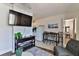 Open concept living and kitchen area with dining table at 3509 S Atlantic Ave # 108 & 109, New Smyrna Beach, FL 32169