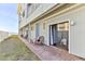 Private patio with brick pavers and ocean view at 3509 S Atlantic Ave # 108 & 109, New Smyrna Beach, FL 32169