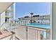 View of the community pool from condo building at 3509 S Atlantic Ave # 108 & 109, New Smyrna Beach, FL 32169