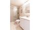 Bathroom with shower, toilet, and white vanity at 3801 S Atlantic Ave # Ut104, New Smyrna Beach, FL 32169
