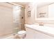 Bathroom with shower, toilet and white vanity at 3801 S Atlantic Ave # Ut104, New Smyrna Beach, FL 32169