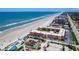 Aerial view of the building's location on the beach at 3801 S Atlantic Ave # Ut104, New Smyrna Beach, FL 32169