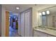 Bathroom with granite vanity and walk-in shower at 4139 Atlantic # A406, New Smyrna Beach, FL 32169