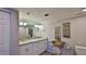 Double vanity bathroom with granite countertop at 4139 Atlantic # A406, New Smyrna Beach, FL 32169