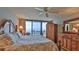 King bedroom with ocean view and built-in wardrobe at 4139 Atlantic # A406, New Smyrna Beach, FL 32169