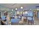 Elegant dining area with a view of the ocean and kitchen at 4139 Atlantic # A406, New Smyrna Beach, FL 32169