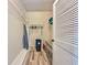Laundry closet with shelving and hanging rod at 4150 S Atlantic Ave # 103A, New Smyrna Beach, FL 32169