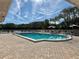 Refreshing community pool with ample surrounding deck space at 4150 S Atlantic Ave # 103A, New Smyrna Beach, FL 32169