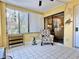 Relaxing sunroom with comfy seating and access to outdoor space at 4150 S Atlantic Ave # 103A, New Smyrna Beach, FL 32169