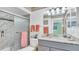 Clean bathroom with granite countertop and updated fixtures at 4411 Sea Mist Ct # 275, New Smyrna Beach, FL 32169