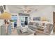 Living room with comfortable seating, TV, and access to a patio at 4411 Sea Mist Ct # 275, New Smyrna Beach, FL 32169