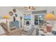 Bright living room with comfy seating and a large TV at 4411 Sea Mist Ct # 275, New Smyrna Beach, FL 32169