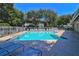 Refreshing community pool with plenty of lounge chairs at 4411 Sea Mist Ct # 275, New Smyrna Beach, FL 32169