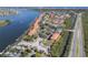Aerial view of waterfront community with boat slips and pool at 460 Bouchelle Dr # 305, New Smyrna Beach, FL 32169